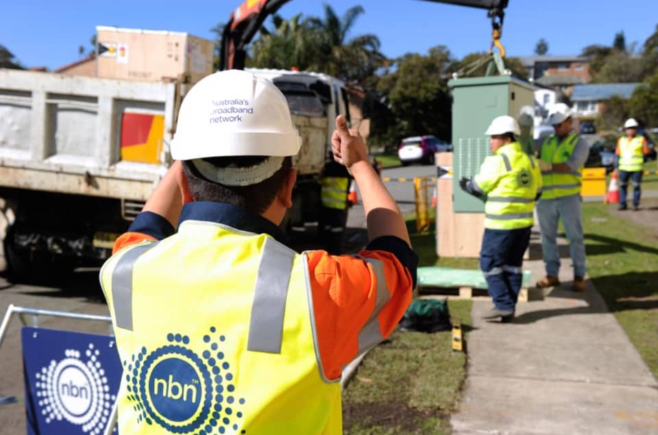 NBN workers installing a node